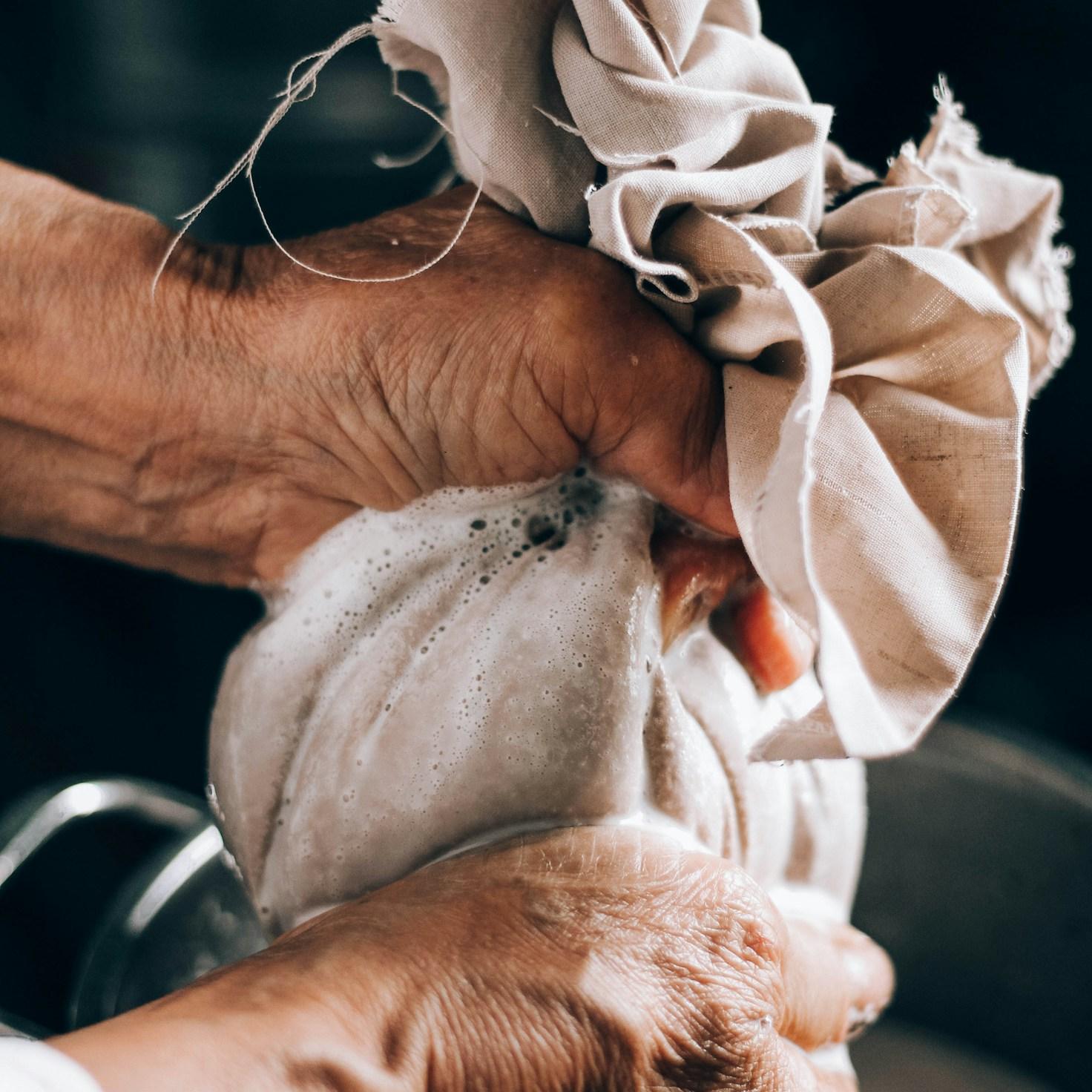 Community members collaborating in a modern kitchen space, sharing recipes and cooking techniques